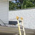 Ladder up to the roof of house