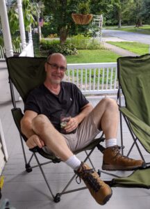 camp chair with footrest on porch